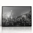 Large abstract wall art featuring swirling blue and gray tones on canvas, ideal for modern living room decor.