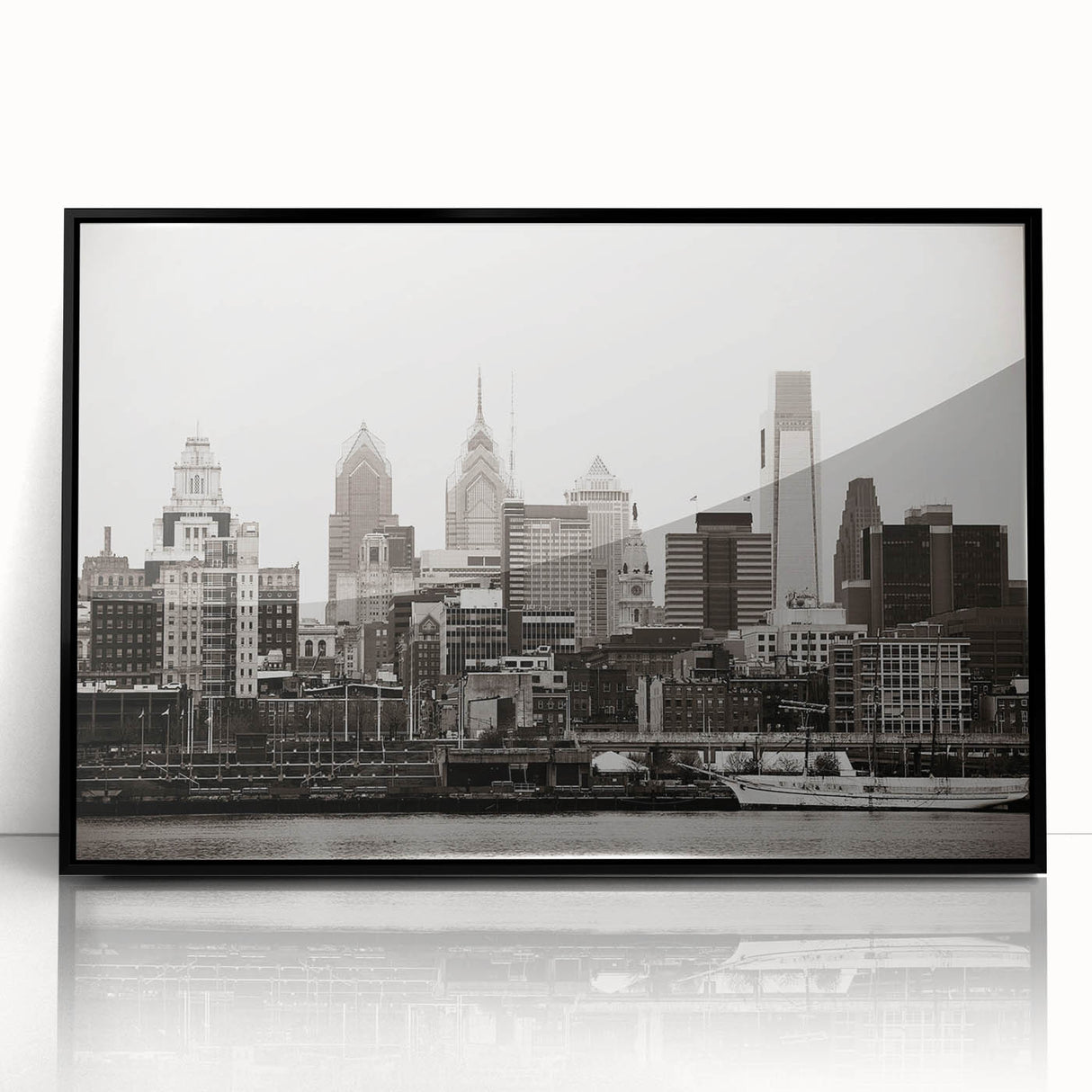Large abstract wall art featuring swirling blue and gray tones on canvas, suitable for modern living room decor.