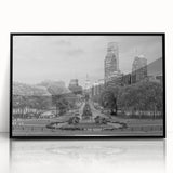 Large abstract wall art featuring swirling blue and gray tones on canvas, ideal for modern living room decor.