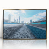 Large art print of a mid-century modernist cityscape in muted gray and blue tones on canvas.