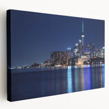 Large abstract canvas art featuring swirling blues and grays, suitable for kitchen wall decor.