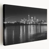 Large abstract canvas art featuring swirling blue and white tones, suitable for kitchen wall decor.