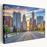 Large abstract kitchen wall art featuring vibrant orange and blue swirls on rolled canvas.