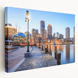 Large abstract canvas art featuring vibrant blue and orange swirls, suitable for kitchen wall decor.