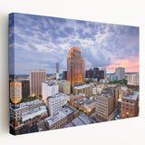 Large abstract canvas art with swirling blue and green tones, ideal for kitchen wall decor.