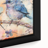 Close-up of a framed canvas showcasing vibrant African tribal art with intricate patterns and rich colors, ideal for enhancing home decor and cultural ambiance.