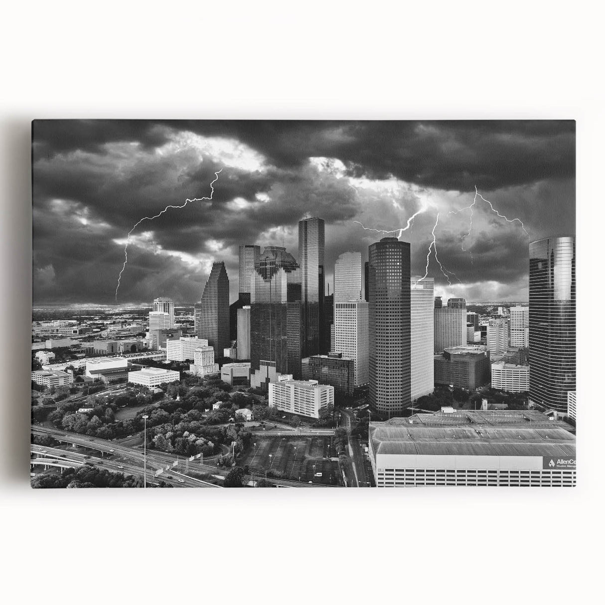 Large black and white abstract print on canvas, featuring dynamic brush strokes.