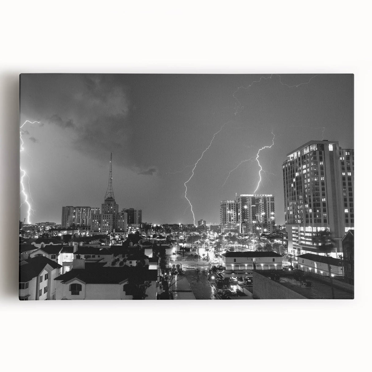 Large black and white acrylic print of a bustling cityscape, ideal for kitchen wall art or bedroom ambiance.