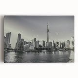 Large black and white abstract canvas print featuring fluid shapes, ideal for kitchen wall art or bedroom decor.