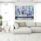 Serene Blessings, Light Blue Western Wall art by Avigdor Ben-Ari, displayed above a white couch, showcasing contemporary Jewish wall art in a modern interior setting.