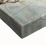 Close-up of a stretched canvas showcasing vibrant African wall art with intricate patterns and textures, perfect for adding cultural flair to any room's decor.