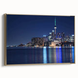 Landscape painting of a serene lake at dusk, featuring muted blue and black tones on a framed poster.