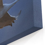 Elegant Crane Wall Art - Graceful Crane in Flight at Dusk Canvas Print