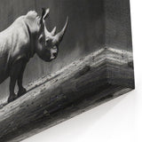 Dramatic Rhino in the Spotlight | Black & White Wildlife Canvas Art