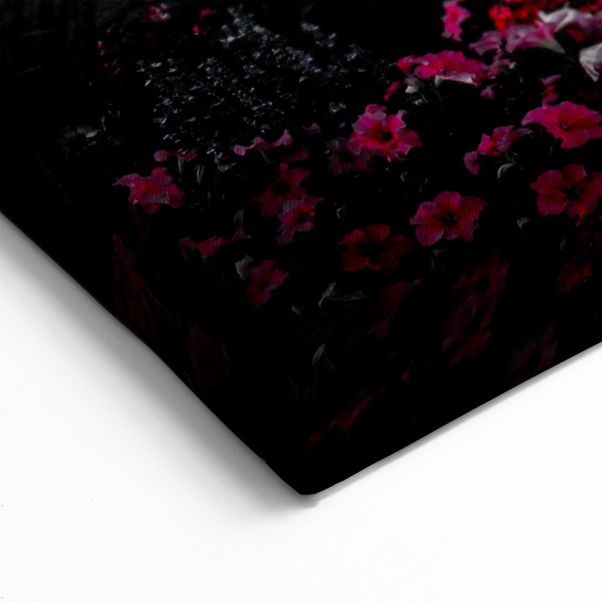 Elegant Black and White Palace Facade with Vibrant Floral Gardens