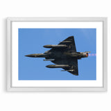 Modern Aviation Art: Fighter Jet in Flight Against Blue Sky Canvas Print