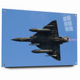Modern Aviation Art: Fighter Jet in Flight Against Blue Sky Canvas Print
