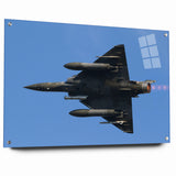 Modern Aviation Art: Fighter Jet in Flight Against Blue Sky Canvas Print