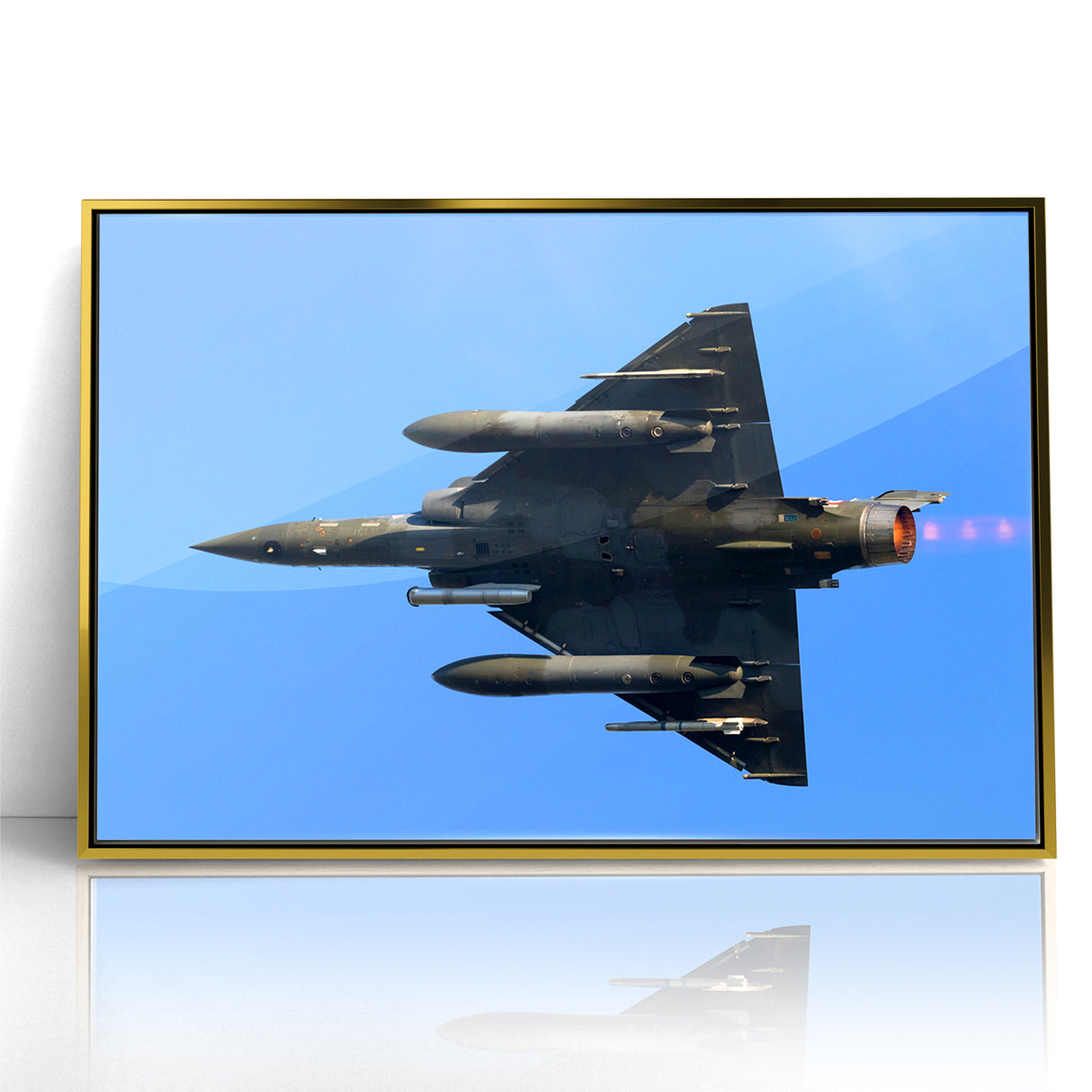 Modern Aviation Art: Fighter Jet in Flight Against Blue Sky Canvas Print