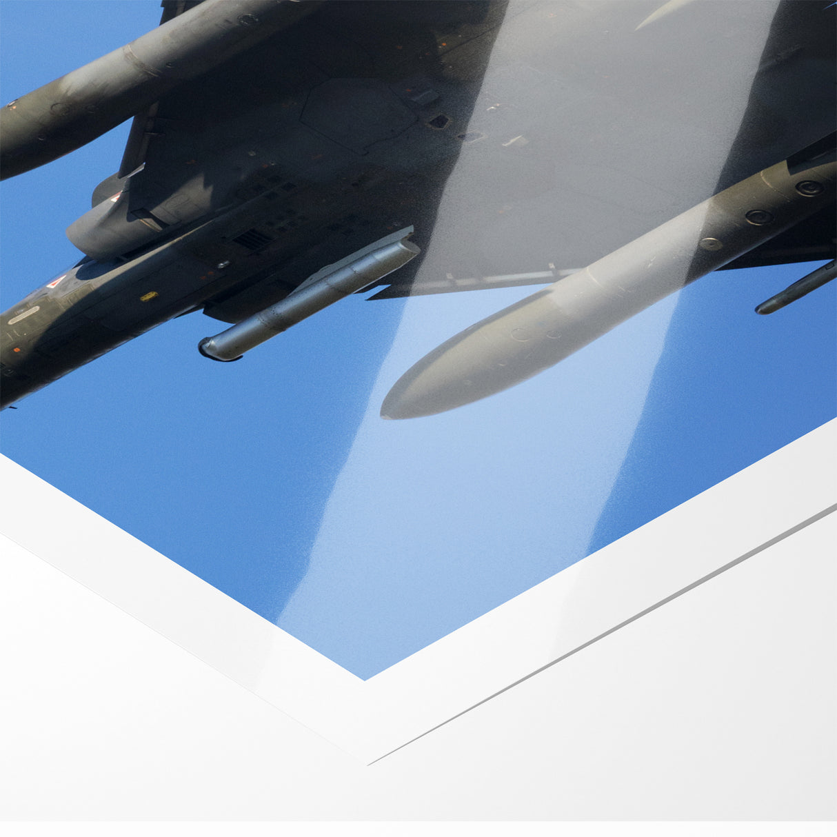 Modern Aviation Art: Fighter Jet in Flight Against Blue Sky Canvas Print