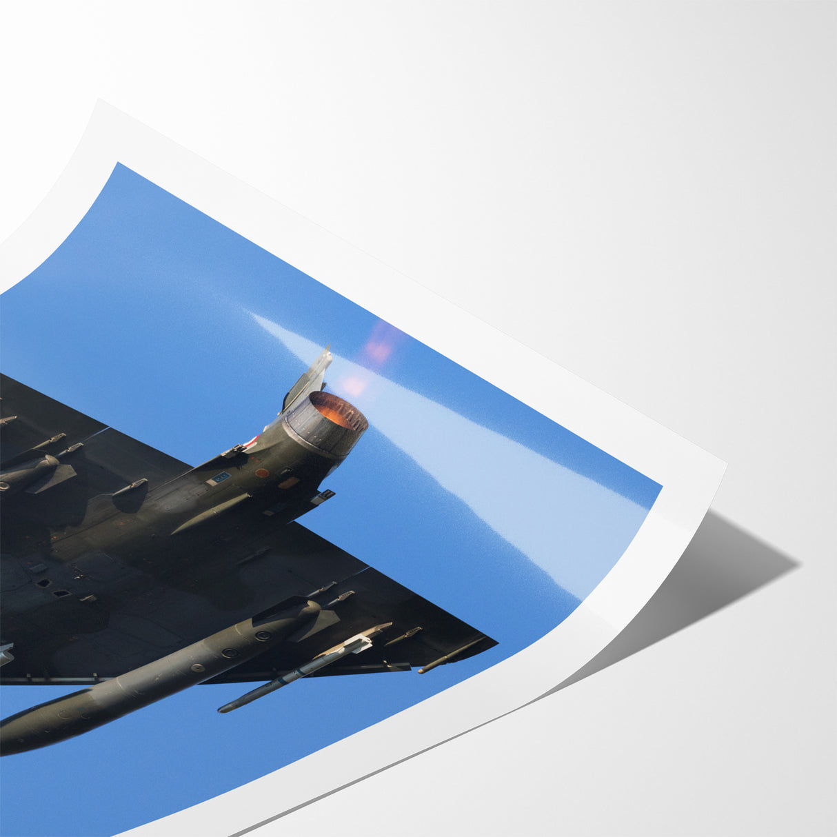 Modern Aviation Art: Fighter Jet in Flight Against Blue Sky Canvas Print