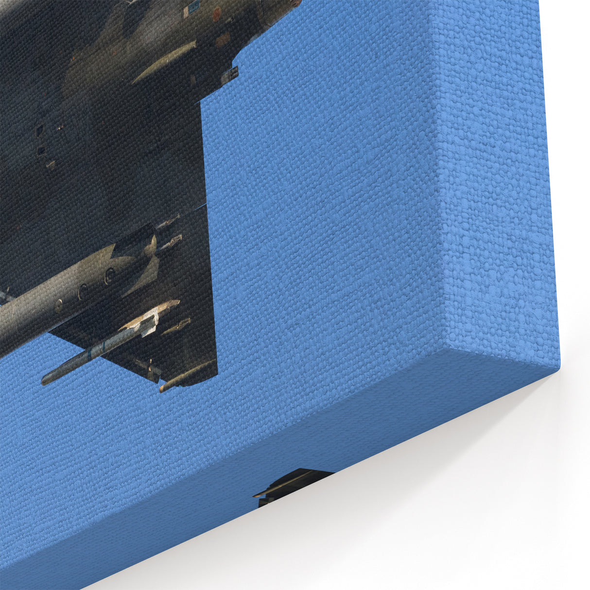 Modern Aviation Art: Fighter Jet in Flight Against Blue Sky Canvas Print