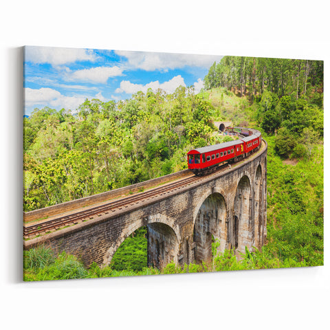 Red Train in Lush Greenery Wall Art - Vibrant Locomotive Canvas Print