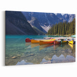 Alberta Scenic Wall Art - Vibrant Canoes on Moraine Lake Canvas Print