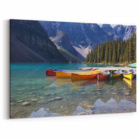 Alberta Scenic Wall Art - Vibrant Canoes on Moraine Lake Canvas Print
