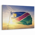 African Scenery Prints - Namibian Flag Illuminated by Sunrise Canvas Art