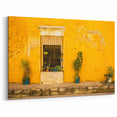 Mexico City Wall Art - Vibrant Yellow Façade with Potted Plants Canvas
