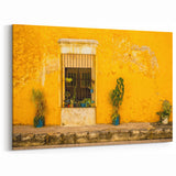 Mexico City Wall Art - Vibrant Yellow Façade with Potted Plants Canvas