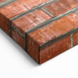 Masonry Wall Art - Religious Relief Sculpture on Brick Wall Canvas Print