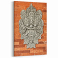 Masonry Wall Art - Intricate Carved Figure on Rustic Brick Canvas Print
