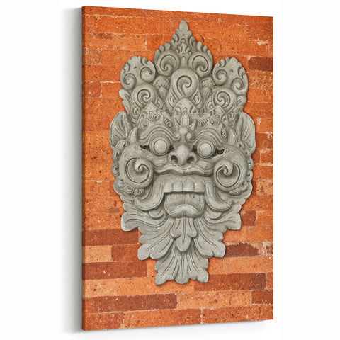 Masonry Wall Art - Intricate Carved Figure on Rustic Brick Canvas Print
