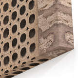 Masonry Wall Art - Hexagonal Patterned Window on Stone Wall Canvas Print