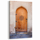Masonry Wall Art - Ornate Wooden Door in Stone Frame Canvas Print