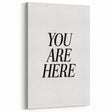 Electric Wall Art: Bold Black Typography 'You Are Here' for Modern Spaces