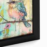 Framed canvas featuring a vibrant African wall art design with intricate patterns and rich colors, elegantly displayed against a neutral background, highlighting its artistic detail.