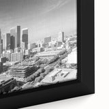 Extra large black wall art featuring a textured abstract design with colorful accents on canvas, ideal for living room decor.