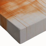 Vibrant abstract wall art canvas showcasing bold colors and geometric shapes, rolled and secured in a protective cardboard tube for easy shipping.