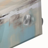 Abstract canvas artwork showcasing vibrant colors and geometric patterns, elegantly rolled and housed in a protective cardboard tube for safe storage and transport.