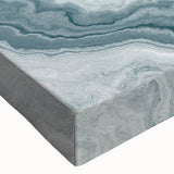 Colorful abstract art canvas print showcasing vibrant swirls of blue, orange, and gold, perfect for modern home decor and artistic expression.