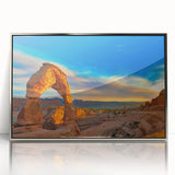 Art deco poster featuring geometric patterns in muted gold and navy tones on canvas.