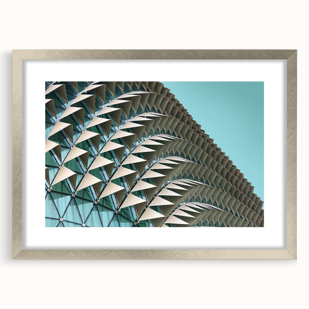 Abstract art print featuring swirling blue and gray tones on a framed canvas, suitable for bedroom or dining room decor.