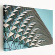 Large abstract canvas art featuring swirling blue and gray tones, ideal for kitchen wall decor.