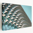 Large abstract canvas art featuring swirling blue and gray tones, ideal for kitchen wall decor.