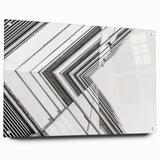 Large abstract wall art on acrylic glass depicting dynamic swirls in blue and gray tones.