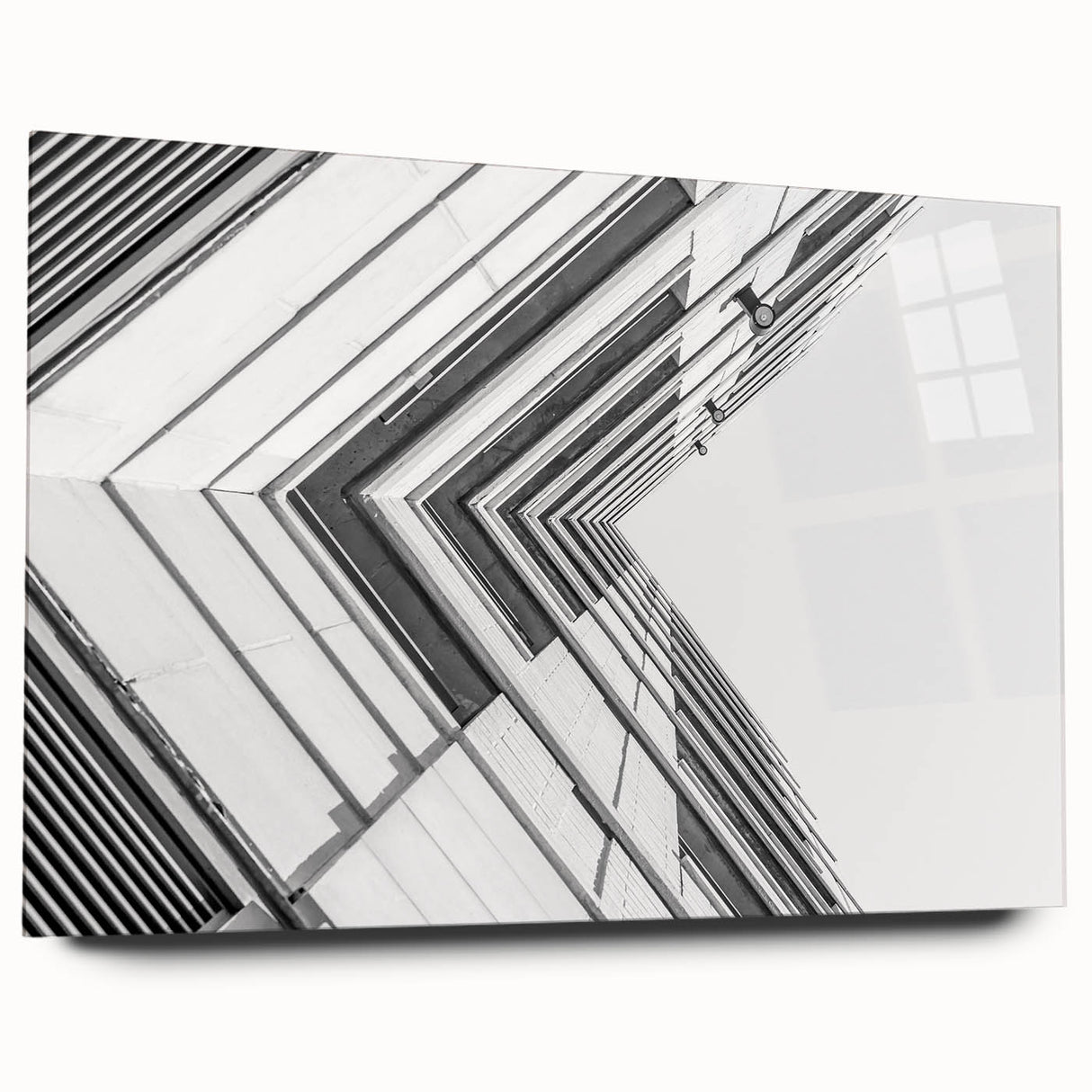 Large abstract wall art on acrylic, featuring swirling blue and white tones, ideal for bedroom or dining room decor.