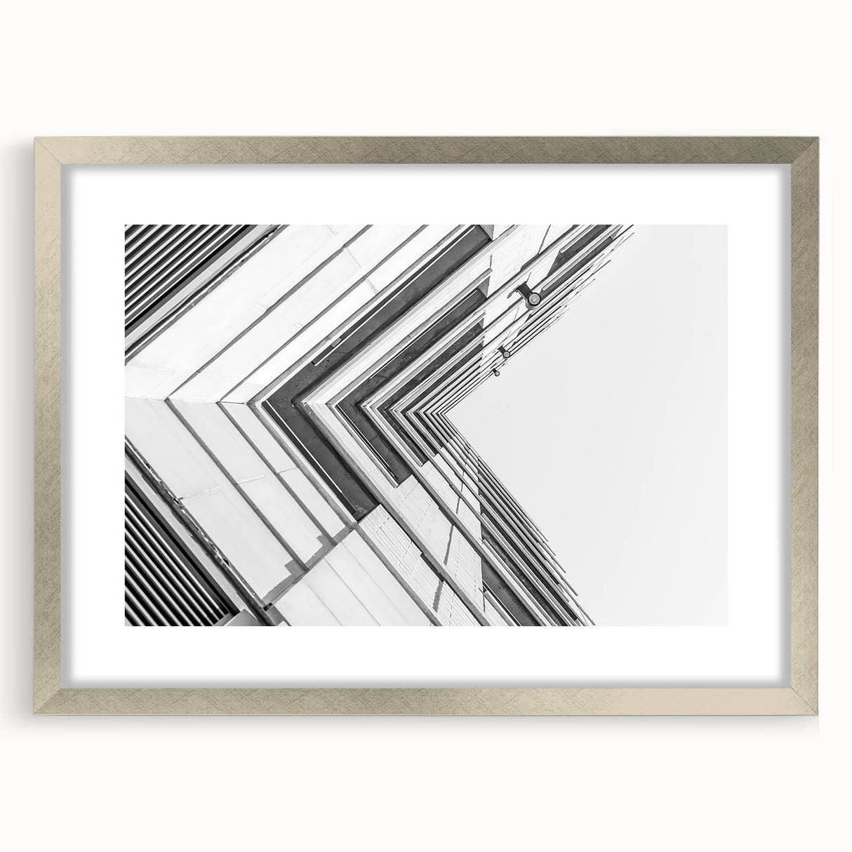 Abstract art print featuring swirling blue and gray tones on a framed canvas, suitable for dining room or bedroom.
